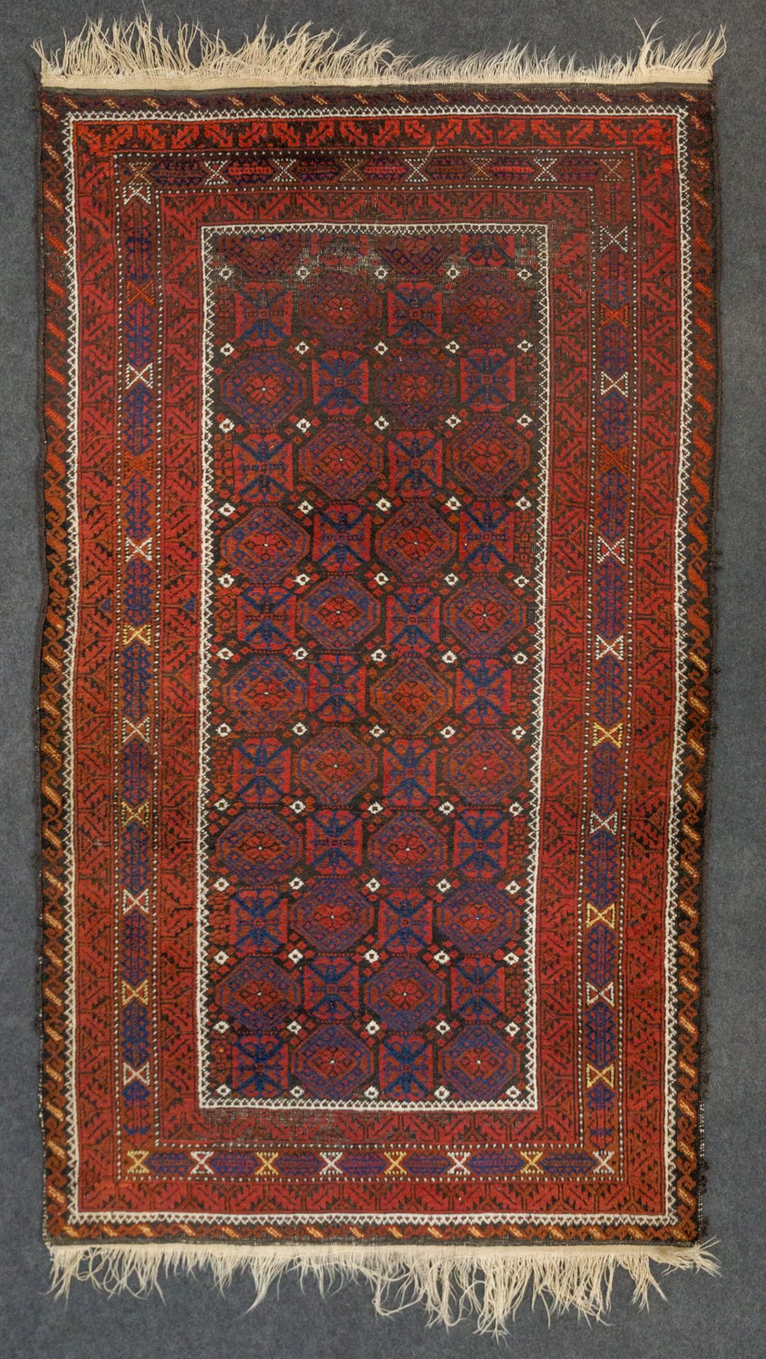 An Eastern hand-made carpet. (114 x 195 cm). - Image 6 of 6