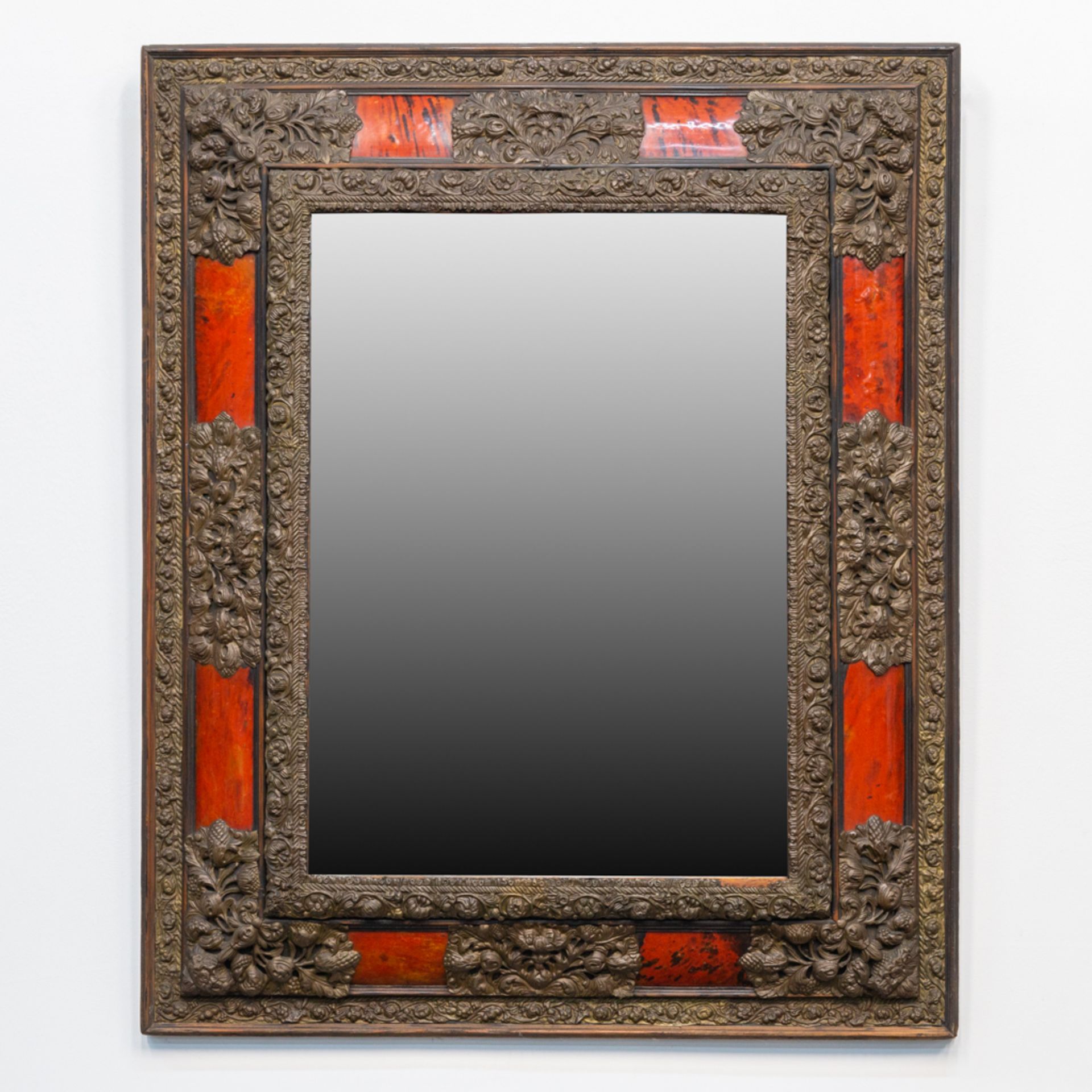 An antique mirror made of glass, copper and tortoise shell. 19th century. (94 x 113 cm)