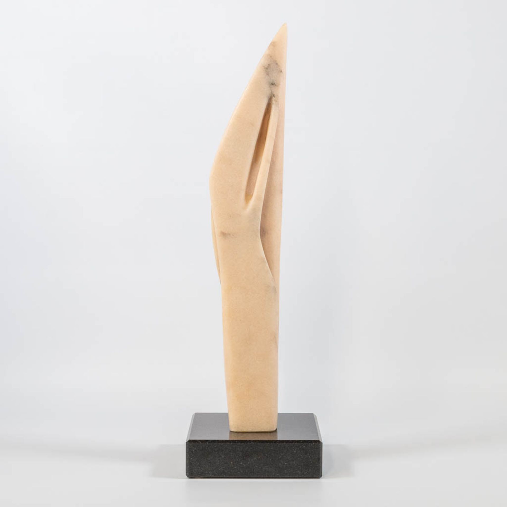Pablo ATCHUGARRY (1954) untitled, pink Portugese marble on a black granite base. (16 x 15 x 53 cm)