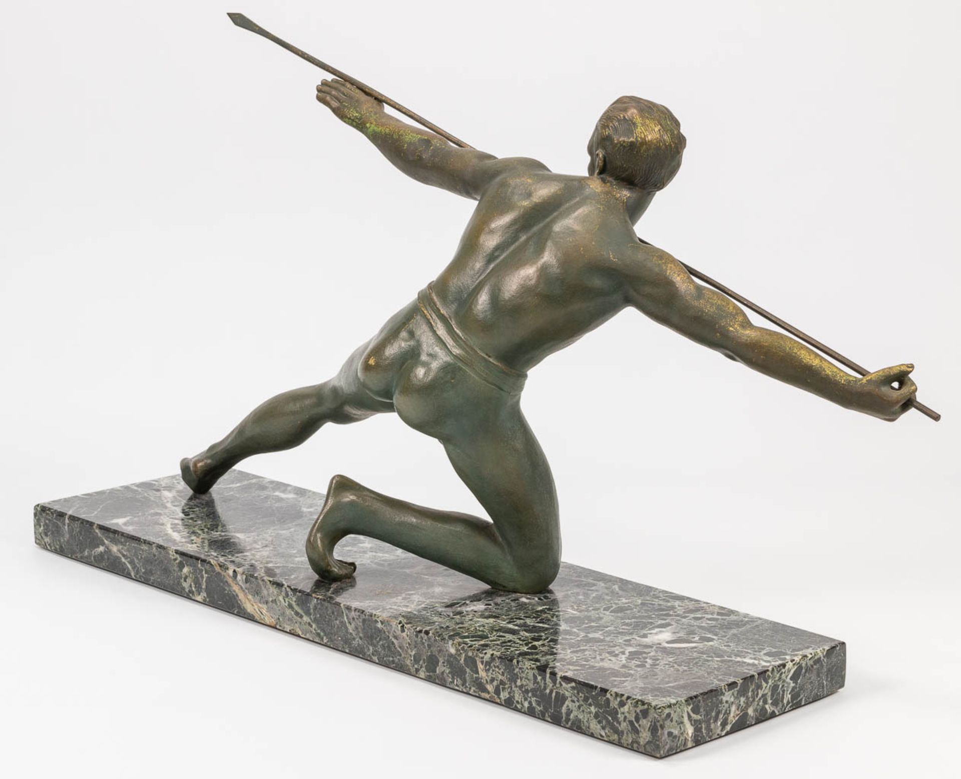A bronze statue of a spear thrower in art deco style and standing on a marble base. The first half o - Bild 13 aus 13