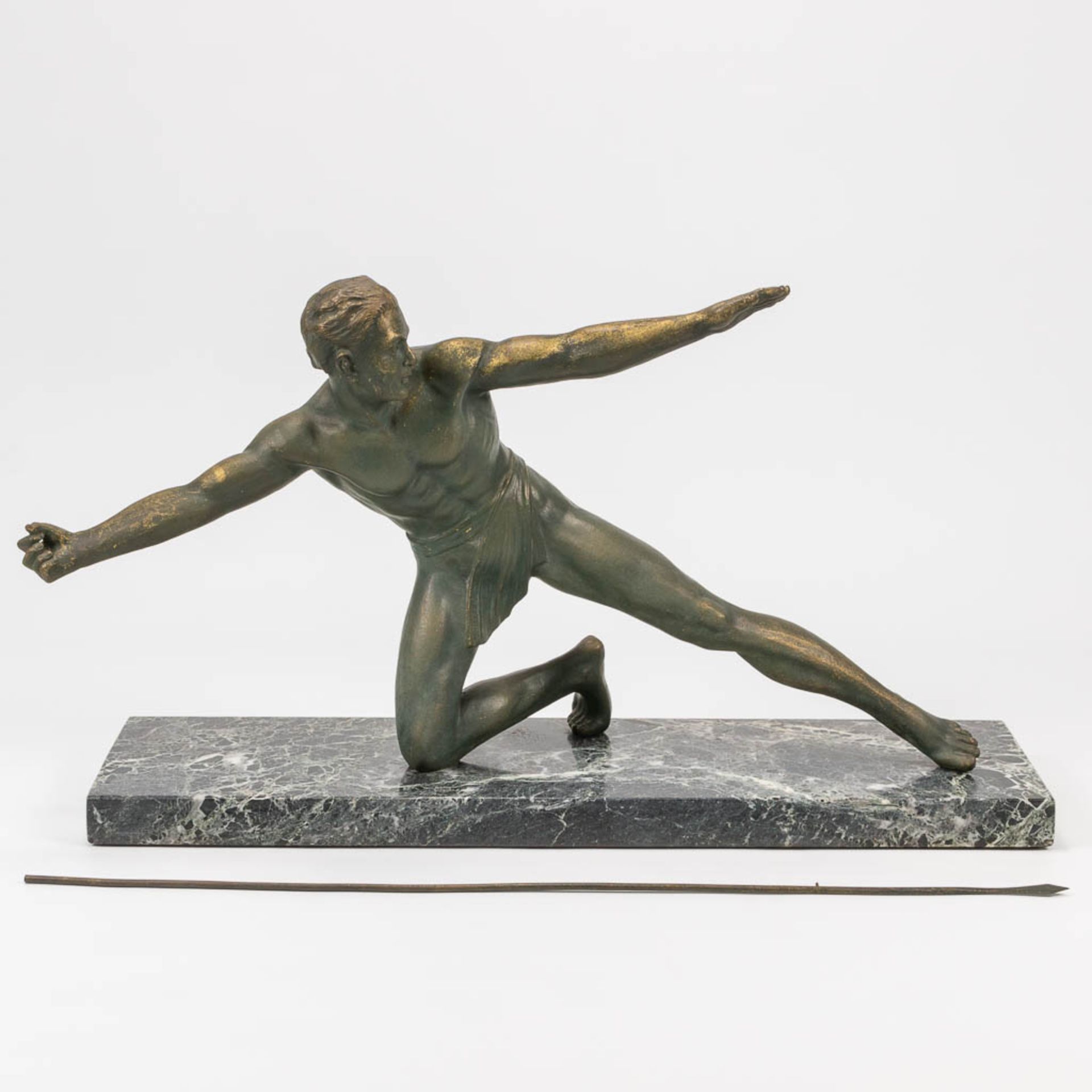 A bronze statue of a spear thrower in art deco style and standing on a marble base. The first half o - Bild 3 aus 13