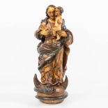 A wood sculptured Madonna with child trampling the serpent on the half moon, Spain, 18th century. (1