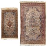 A collection of 2 Oriental hand-made carpets, Kachan. (225 x 140 cm) (158 x 94 cm).