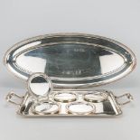 A collection of Christofle silver-plated platters and serving trays of the model 'Malmaison'. (30 x