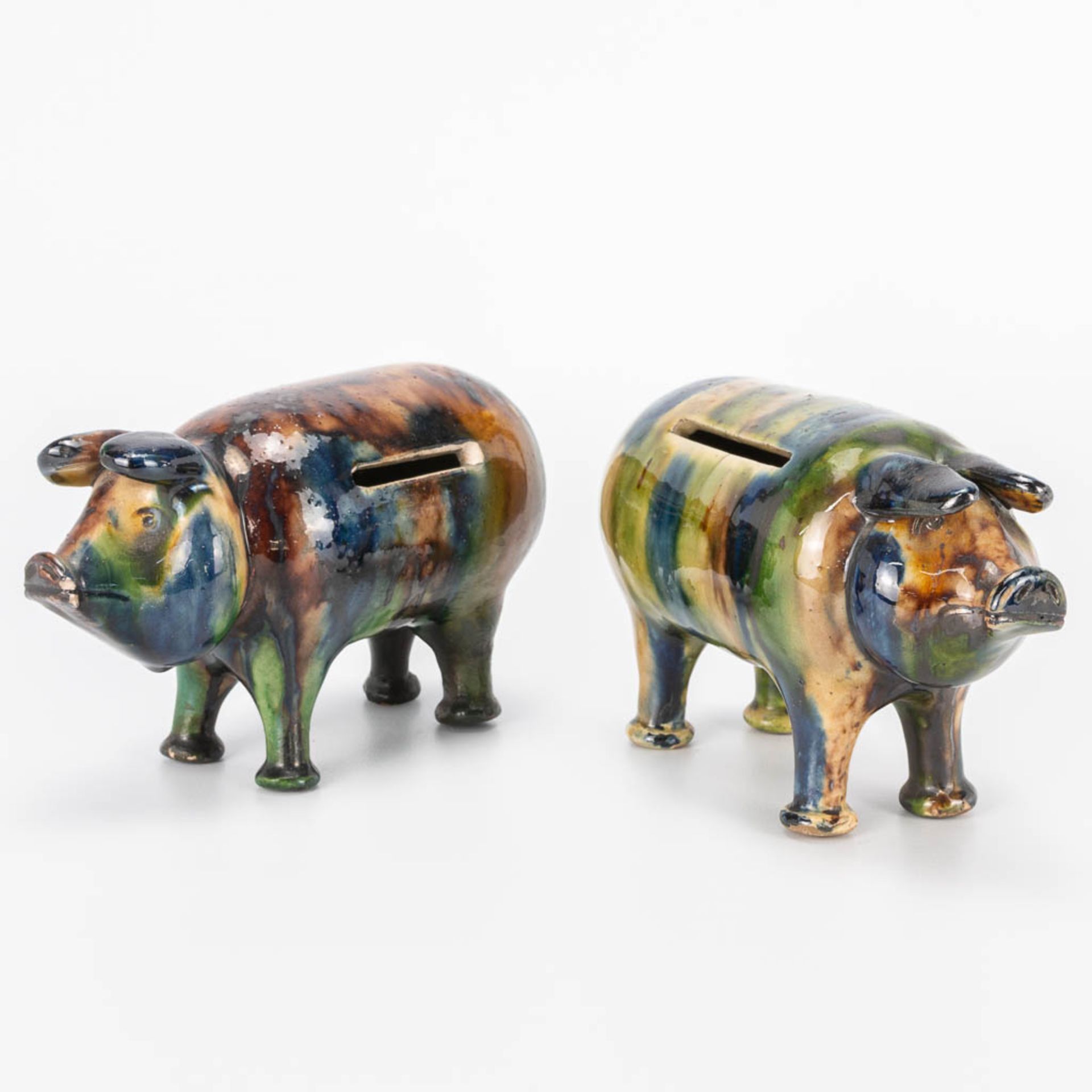 A collection of 2 Piggy banks made of Flemish Earthenware and probably made by Caessens in Kortrijk.