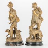 A collection of 2 hunters in terracotta. 19th century. (52 x 22,5 cm)