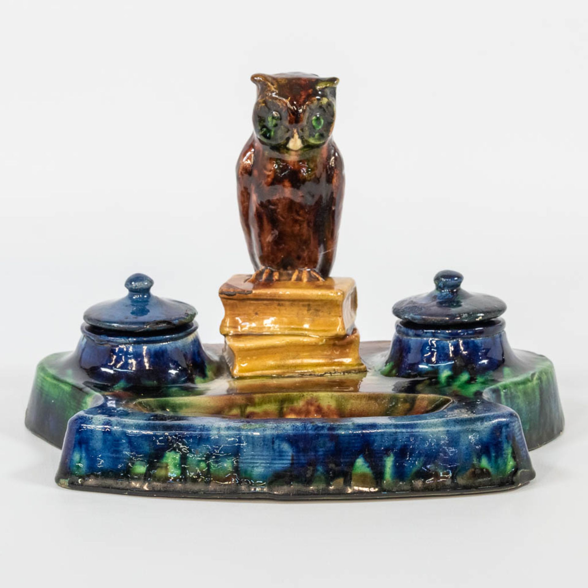 An ink set made of Flemish Earthenware with an owl figurine and marked Made in Belgium, most likely 
