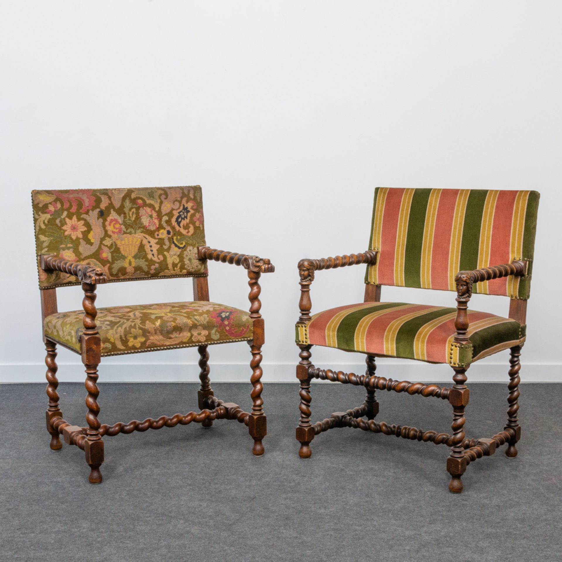 A collection of 2 castle chairs with sculptured handles. 19th century. (92 x 63 x 54 cm)