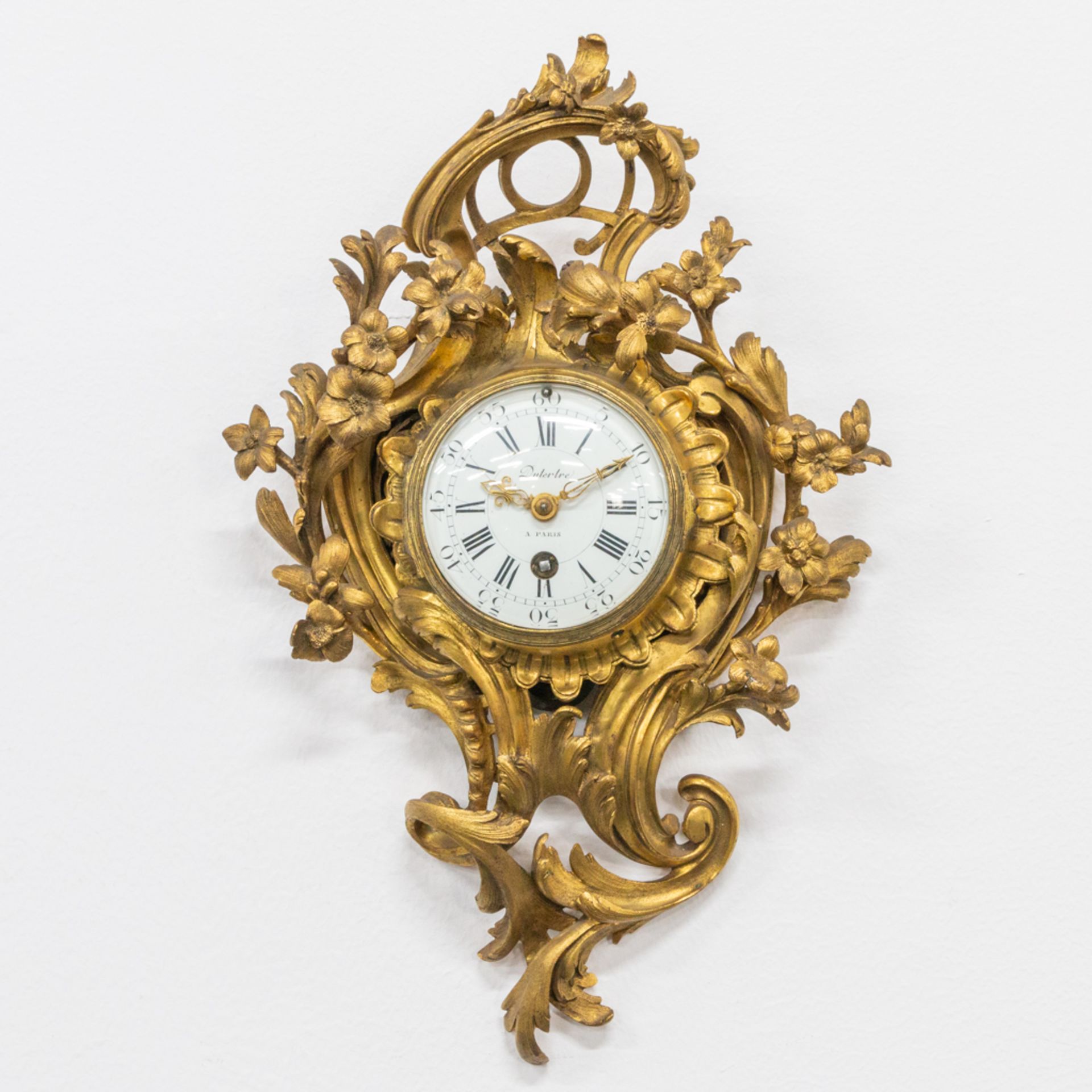 A small cartel clock made of bronze in Louis XV style, Dutertre ˆ Paris and marked Marti 1889. 19th