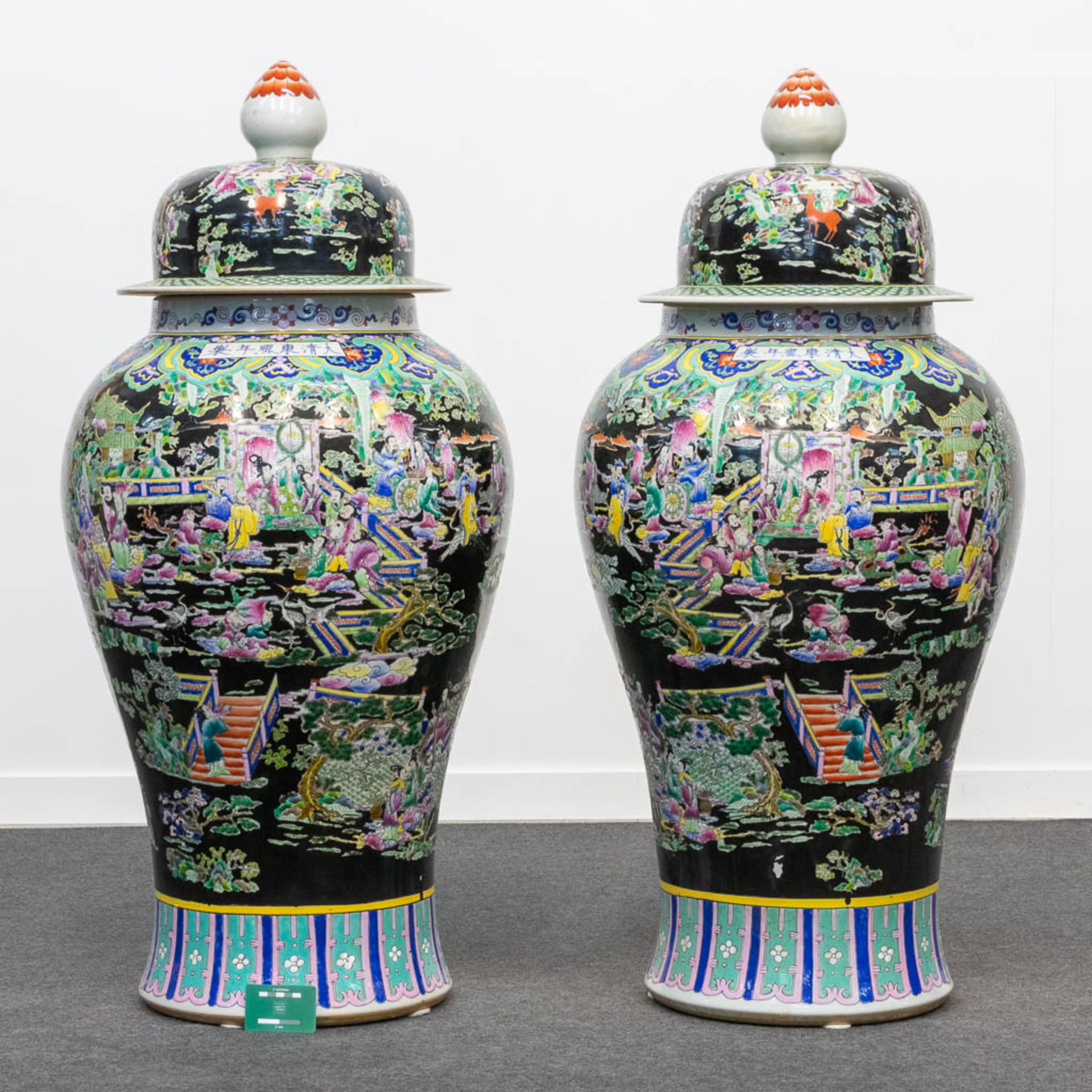 A huge pair of Famille Noir porcelain Chinese vases with a decor of immortals and playing children.  - Bild 9 aus 19