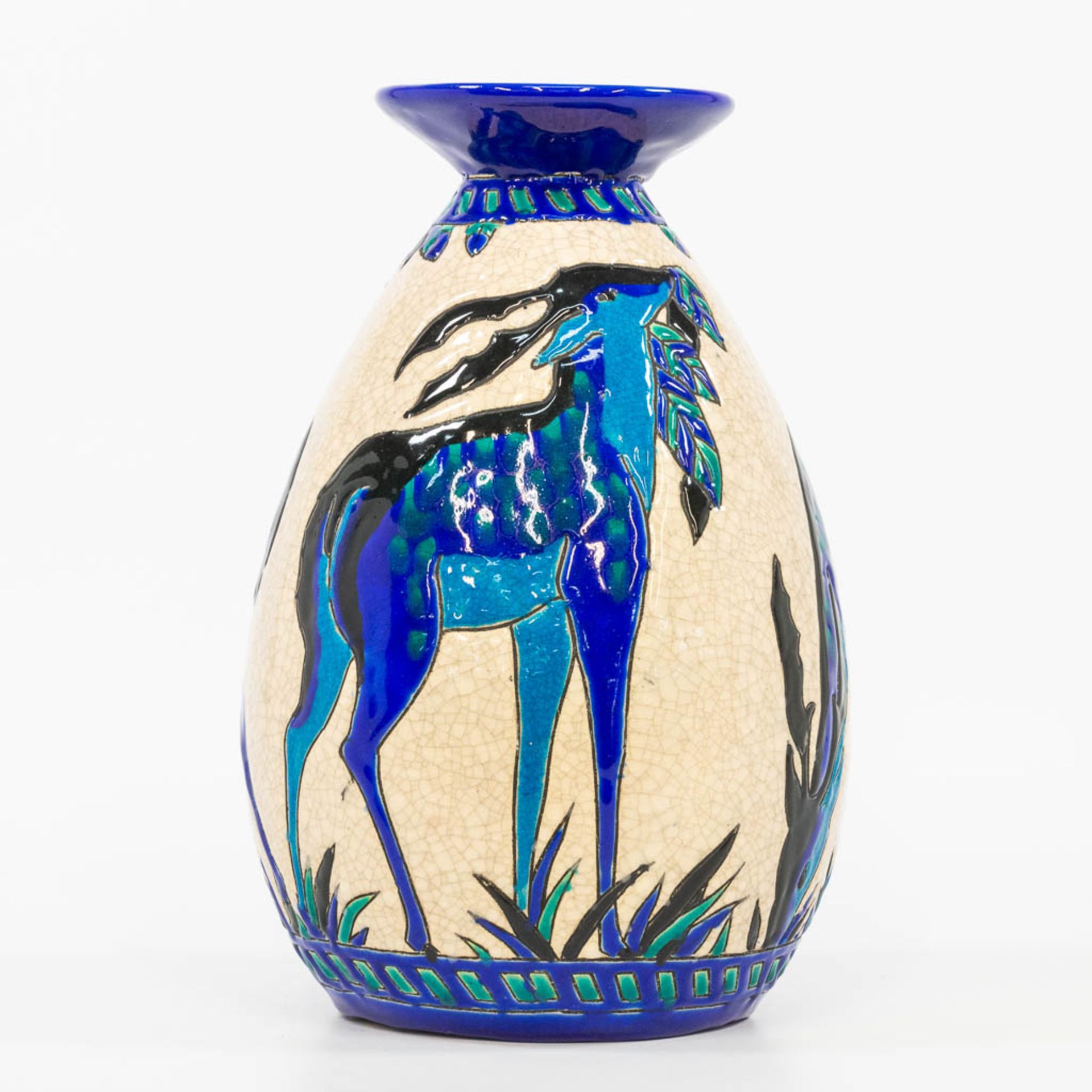 Charles CATTEAU (1880-1966) a glazed ceramic vase with decor 943 and made by Boch. (26,5 x 17 cm)