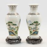 A pair of Chinese vases with hand-painted decor of landscapes with pine trees, Republic period. (20,