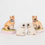 A collection of 2 pairs of porcelain dogs, marked L&M and Staffordshire. The second half of the 19th