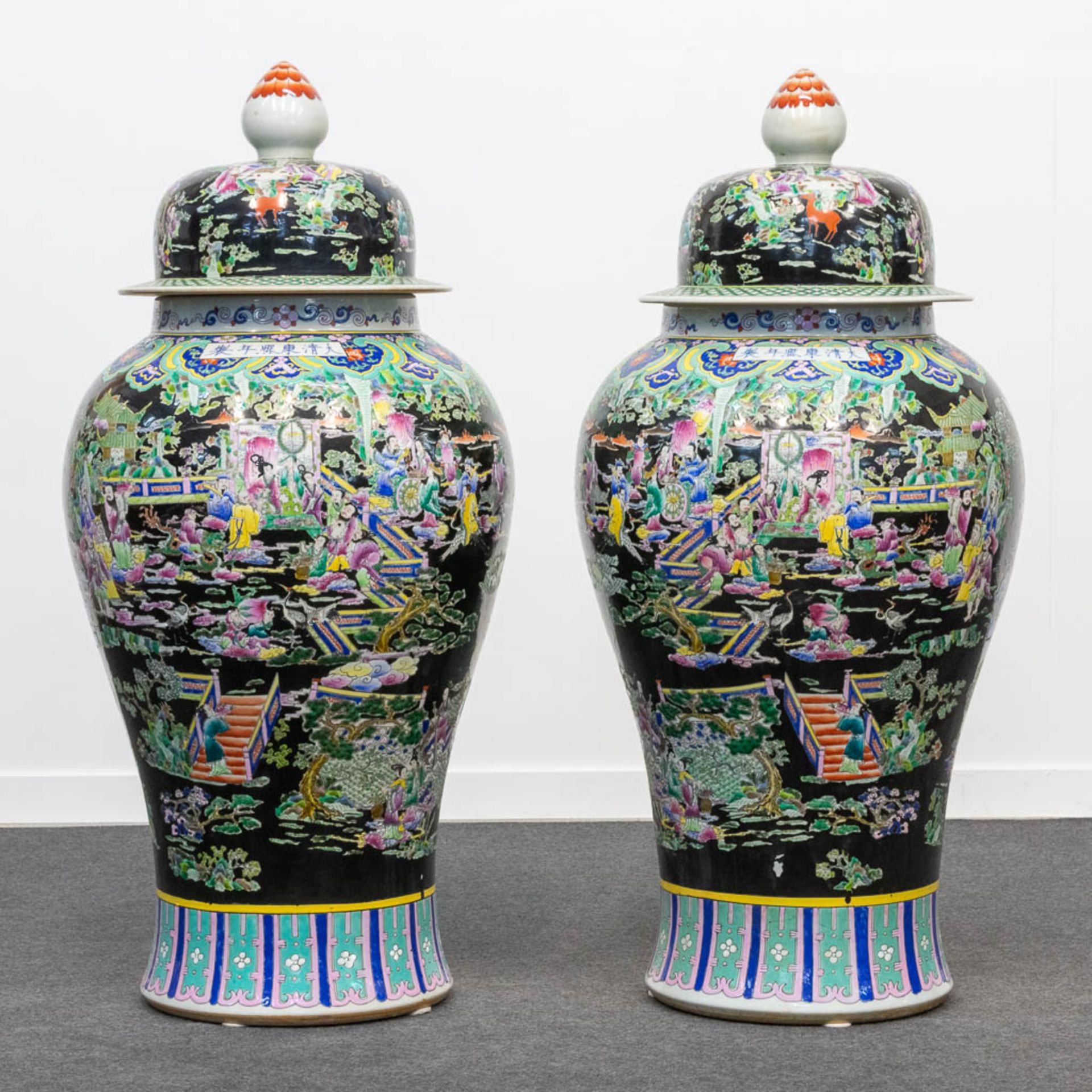 A huge pair of Famille Noir porcelain Chinese vases with a decor of immortals and playing children.  - Bild 5 aus 19