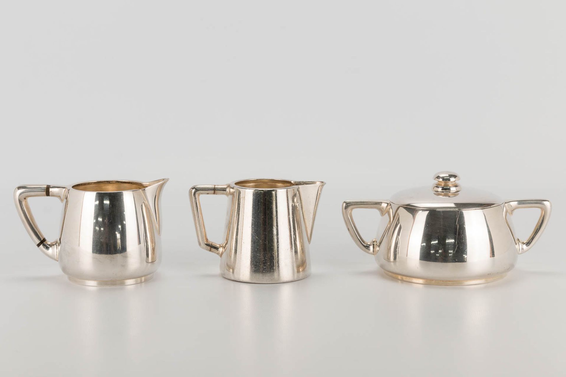 A collection of 4 silver-plated items a champagne bucket, teapot, sugar pot and milk jug made by and - Bild 5 aus 19