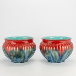 A pair of glazed cache-pots made in faience and during the art deco period, marked Sarreguemines. Ar