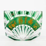 A large vase made of colored and cut crystal in art deco style, images of Eastern figurines. Flor De