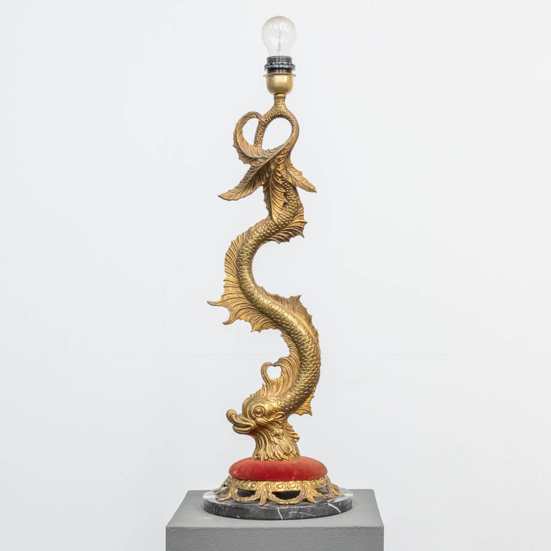 A table lamp made of bronze on a marble base in the shape of a fish. The second half of the 20th cen
