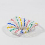 A small plate/bowl made with colored glass filigree and with bent sides, made in Murano, Italy aroun