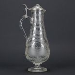 An antique pitcher made of Boheme glass with etched decor and finished with a lid made of tin. 19th