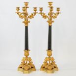 A pair of candelabra, empire style, made of gilt bronze. 19th century. (60 x 19 cm)