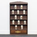 A Hummel wood spice cabinet with porcelain pots. (8 x 47 x 84 cm)