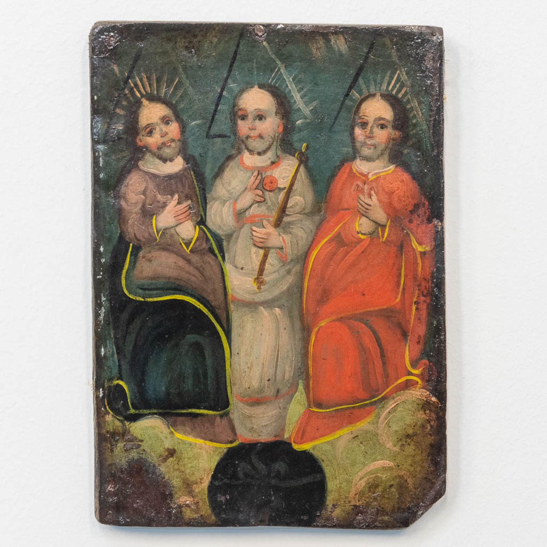 No signature found, an antique painting of 3 holy figurines, oil on metal, mounted on a wood panel. 