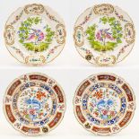 A collection of 2 pairs of faience display plates with hand-painted decor and made in Clamecy, Franc