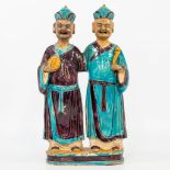 A statue made of glazed earthenware, a pair of Easern figurines. (8,5 x 24 x 41 cm)