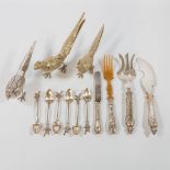 An assembled collection of silver and silver-plated items.