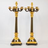 A pair of candelabra, empire style, combination of patinated and gilt bronze on a marble base, 19th