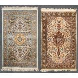 A collection of 2 Oriental hand-made carpets, Kachan. (79 x 129 cm)