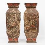 A pair of Japanese display vases made of earthenware with hand-painted relief decor. (21 x 21 x 55,5