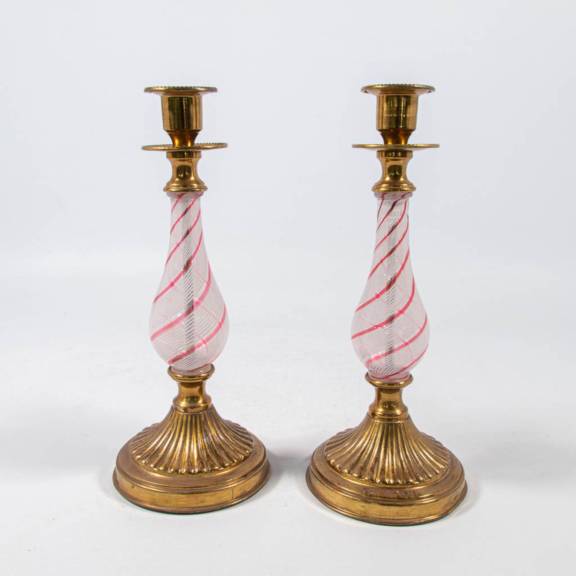 A pair of candlesticks, bronze mounted glass, made in Murano, Italy around 1920. (26 x 11 cm)