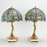 A pair of bronze table lamps with Tiffany style lamp shades. The second half of the 20th century. (4