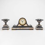 A three piece garniture clock made of marble and bronze. The first half of the 20th century. (13,5 x