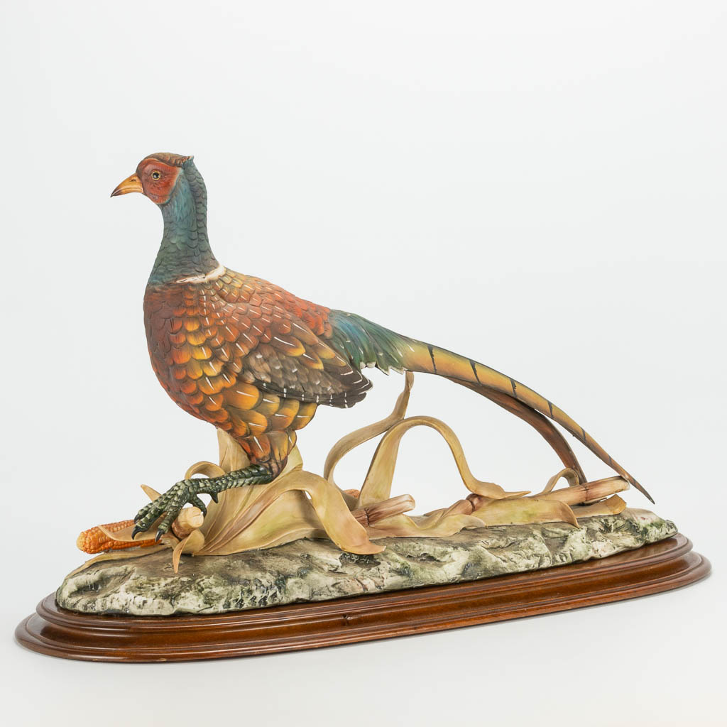 A Capodimonte porcelain figurine of a pheasant marked Edoardo Tasca. 616/1000. (36 x 59 x 35 cm)
