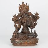 A bronze statue of Guanyin, decorated with semi-precious stones. 19th century. (13 x 20 x 30 cm)
