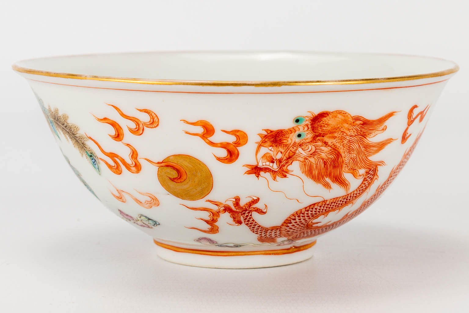 A bowl made of Chinese porcelain with images of a dragon and phoenix, Guangxu, 19th century. (5 x 11 - Image 10 of 13