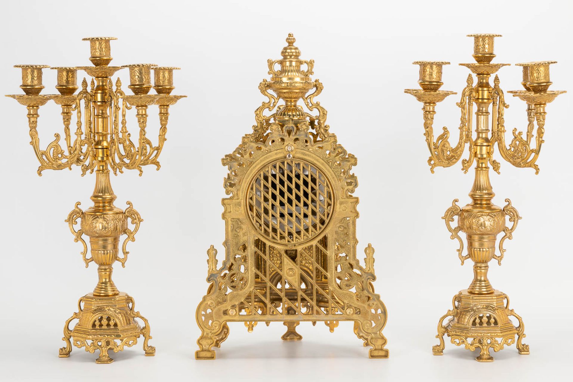 A 3 piece garniture clockset made of bronze, consisting of a clock and 2 candelabra. Battery operate - Image 6 of 14