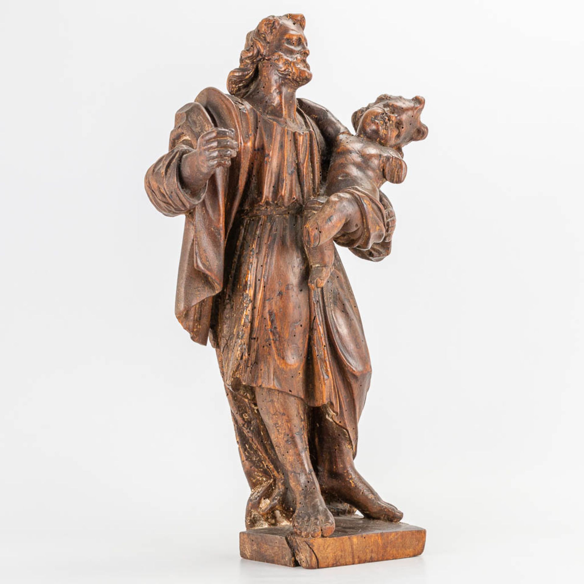 An antique wood sculptured statue of 'Joseph and Child.' 17th/18th century. (14 x 27 x 48 cm) - Image 5 of 11