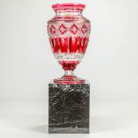 An exceptionally large Val Saint Lambert cut crystal vase, standing on a marble base with illuminati