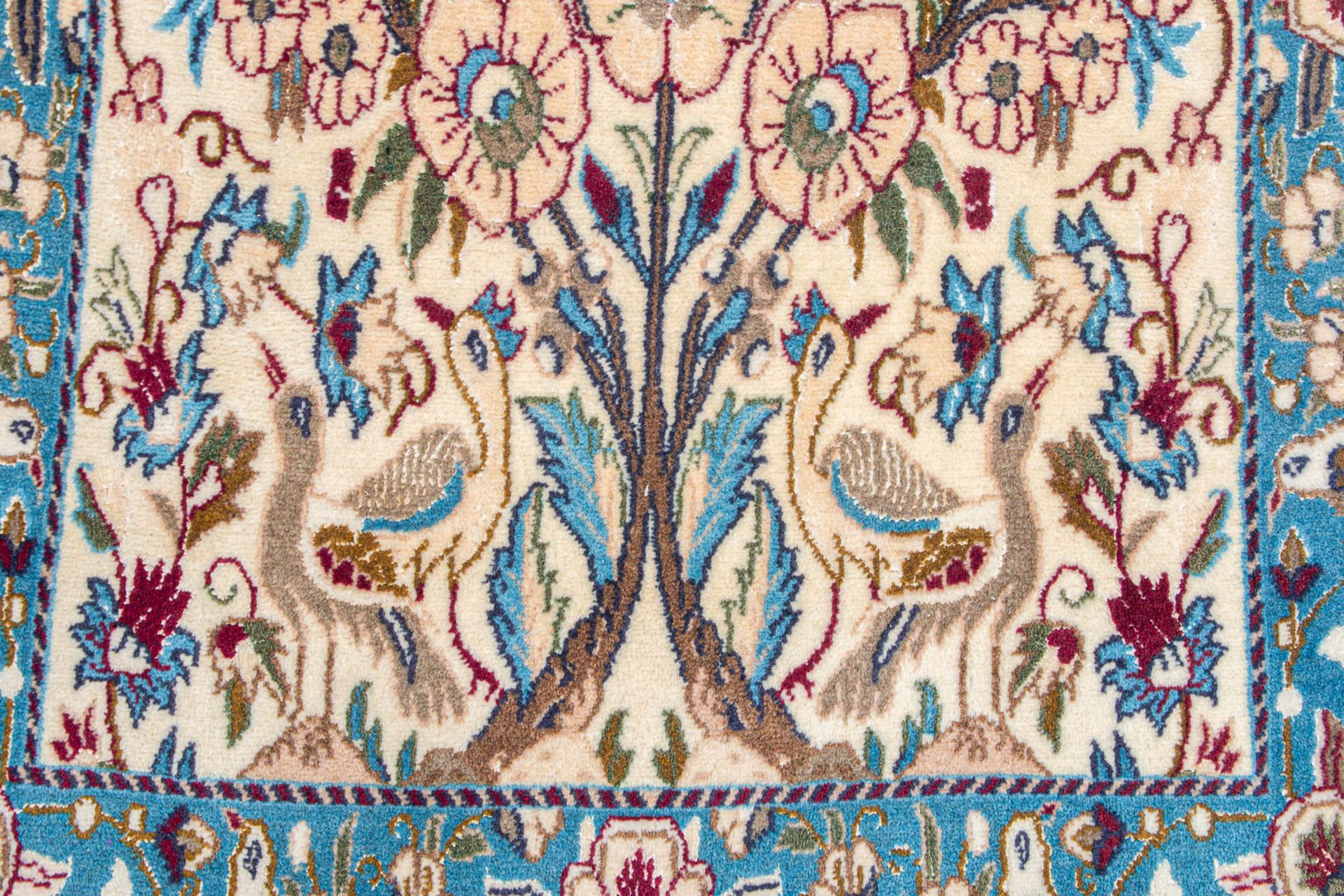 An Oriental hand-made carpet with birds. (83 x 129 cm) - Image 2 of 6