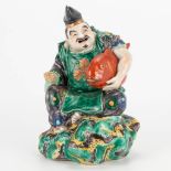 A Chinese porcelain statue of a fisherman. 19th/20th century. (11 x 14 x 20 cm)