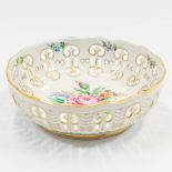 A bowl with hand-painted flower decor and ajour edges, made in Plaue, Germany, the second half of th