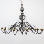 an exceptionally large and decorative metal chandelier. (114 x 145 cm)
