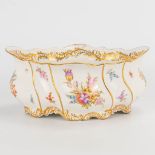 A jardiniere made of porcelain with a hand-painted flower decor and marked with crossed swords, Meis