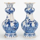 A pair of blue-white display vases made in Delft and marked Van Duijn. (26 x 14 cm)