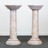 A pair of pedestals made of marble. The second half of the 20th century. (80 x 36 cm)