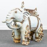A ceramic statue of an elephant, probably made in Birma. (33 x 73 x 65 cm)
